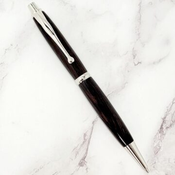Wenge Click Pencil on a marble tabletop
