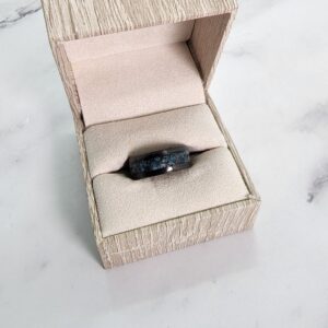 Apatite Carbon Fibre Ring in a ring box